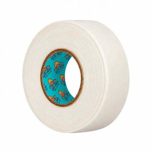 A roll of off-white or cream-colored masking tape with a brown cardboard core and a blue inner backing printed with cartoon graphics, shown on a plain white background.